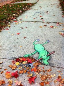 Alien sweeps leaves grafitti