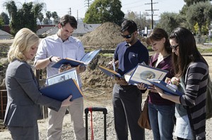The parks crew read out the scripts for the canvassing. 