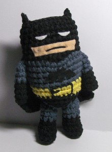 The Caped Crusader, but small and made of yarn. 